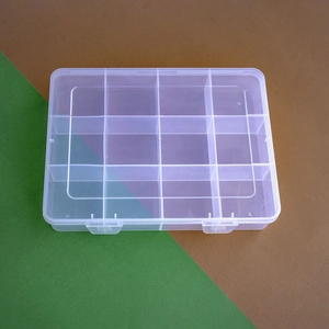 Top view of 15-compartment transparent plastic organizer box for jewelry and beads