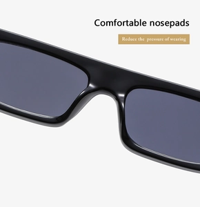 Detail of comfortable integrated nose pads on black square frame sunglasses