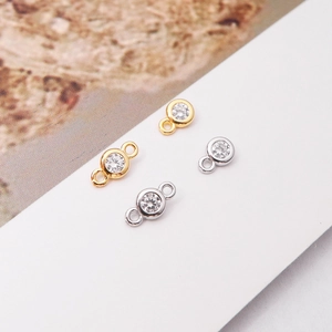 Detail of 925 sterling silver connector charms with cubic zirconia for DIY jewelry