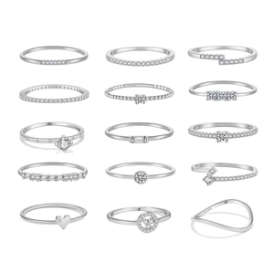 Set of 15 S925 sterling silver minimalist rings with cubic zirconia in a white background