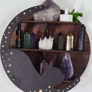 Detail of Boho wooden crescent moon shelf with a black cat silhouette and gold star accents
