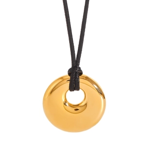 Polished 18k gold donut pendant on dark brown wax cord necklace with minimalist design