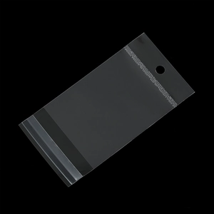 Close-up of clear OPP self-adhesive plastic bag with hanging hole and sealing strip