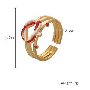 Detail view of adjustable gold ring size specs and colorful enamel heart pattern