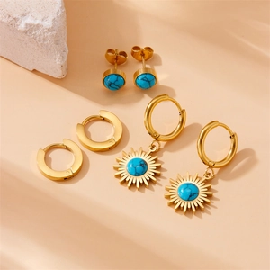 Three-piece gold stainless steel earring set featuring blue turquoise beads and sunburst charms