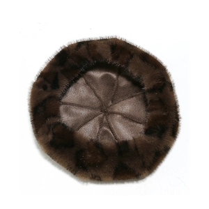 Top-down view of brown leopard print faux fur beret with soft plush texture details