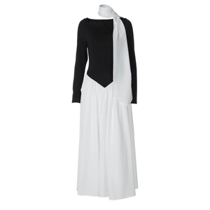 Detail view of the black and white contrast long sleeve dress with matching choker neck piece