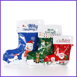 Christmas stocking shaped self-standing plastic pouches with Santa and snowman designs