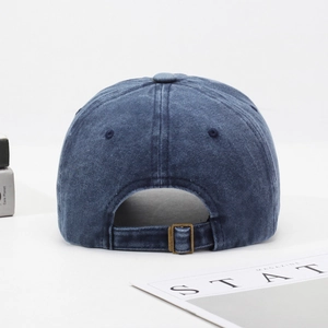 Navy blue washed cotton baseball cap with adjustable vintage metal buckle back closure