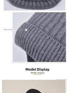 Detail of grey ribbed knit beanie showing high-quality stitching and thick fabric texture