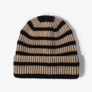 Winter striped knit beanie in khaki and black color with thick ribbed wool texture
