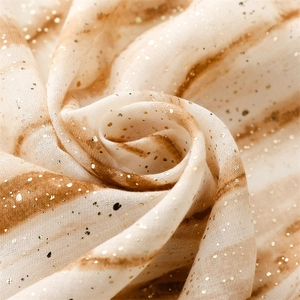 Detail of soft linen-feel scarf fabric with gold foil accents and gradient dye texture