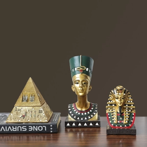 Golden Egyptian figurines set featuring pyramid and Nefertiti resin handicrafts