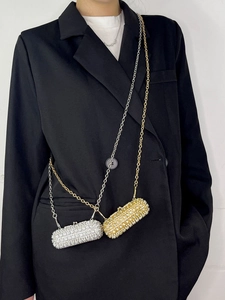 Mini crystal lipstick crossbody bags in gold and silver finish with elegant chain straps