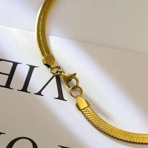 Polished 18k gold plated stainless steel herringbone snake chain with lobster clasp
