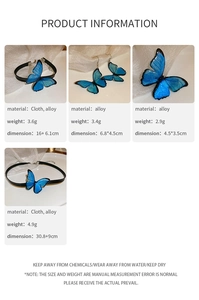 Detailed product dimensions and materials for the blue butterfly jewelry set on beige fabric