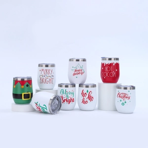 Detailed group display of 12oz stainless steel wine tumblers with festive Christmas prints