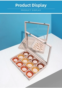 Detail of multi-functional jewelry box with transparent glass lid and velvet slots