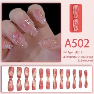 Pink translucent gradient press-on nails with gold foil in long ballerina shape