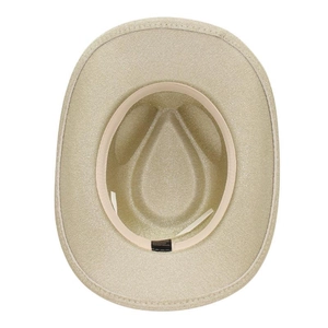 Macro detail of glittery beige cowboy hat interior showing brim and crown structure.