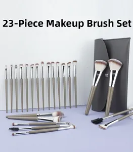 Detailed 23-piece makeup brush set with taupe handles and grey professional storage pouch