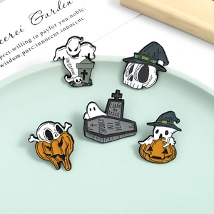 Creative Halloween enamel pin set with ghost, pumpkin skull, and coffin on tray