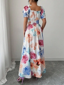 Vue arrière de la robe longue à manches bouffantes, taille haute et imprimé floral