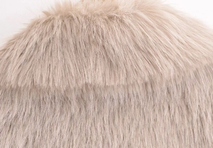 Close-up of soft plush faux fur collar in beige showing premium stitching and texture