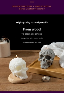 Detailed macro view of floral embossed patterns on skull shaped scented wax candles