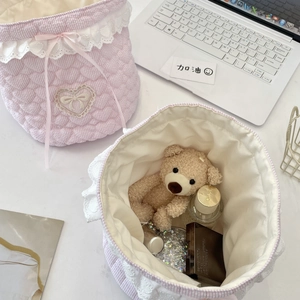 Pink striped quilted fabric baskets with white lace, bows and heart embroidery details