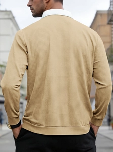 Back view of men's long sleeve polo shirt with premium waffle knit texture in beige