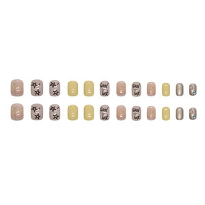 Short square lemon yellow press-on nails with glitter star and Good Luck text