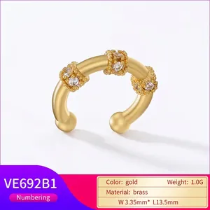 Polished gold brass C-shape ear cuff with micro-set zircons measuring 13.5mm