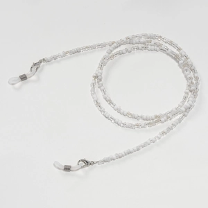 Detail view of colorful seed bead eyewear chain with silver lobster clasps and silicone loops