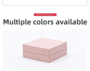 Closed pink square jewelry storage box with textured surface and minimalist design