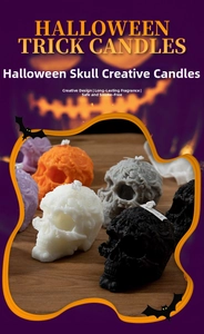 Detail of Halloween skull candles with embossed textures in multiple colors and cotton wicks