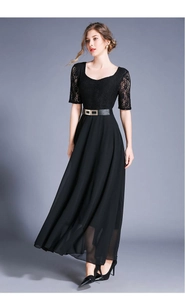 Close-up of black lace bodice with round neck and metal buckle leather belt detail