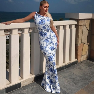 Detail of blue and white floral print maxi dress with sleek sleeveless fit and fishtail hem