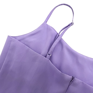 Detail of lavender dress showing adjustable spaghetti straps and high-quality chiffon texture
