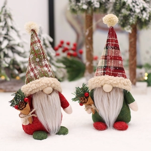 Nordic Christmas gnome dolls with plaid hats holding pine cones in a winter forest scene