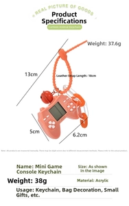 Orange mini handheld game console keychain with size measurements and orange wrist strap