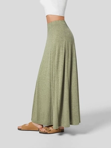 Fashionable green heather knit maxi skirt with loose drape and high waist design