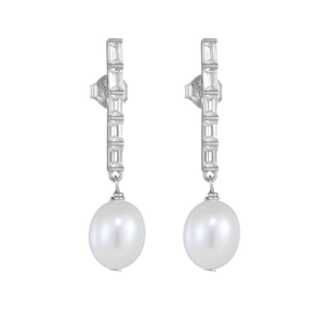 Detail of 925 silver pearl earrings with rectangular zircons on a white background