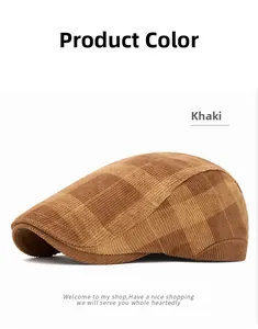 Gros plan d'une casquette plate à carreaux kaki montrant la texture du velours côtelé