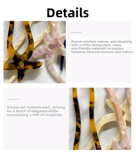 Detailed texture of star-shaped acetate hair pins in amber and marble patterns