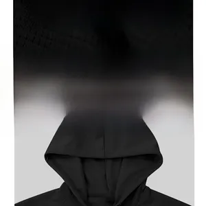 Detail of premium black waffle knit fabric and drawstring hoodie collar structure