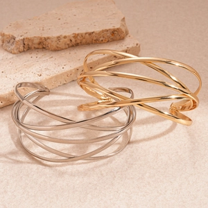 Minimalist geometric multi-layer intertwined open cuffs in gold and silver finishes