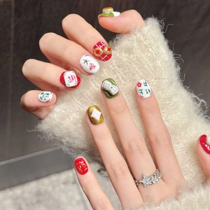 Handmade press-on nails featuring red and green Mahjong elements with 3D lucky charms
