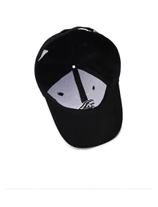 Detail view of the black cotton baseball cap interior with white lining and stitching
