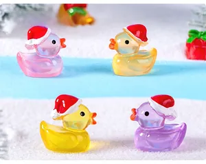 Detail of colorful luminous resin Christmas ducks for micro landscape decoration